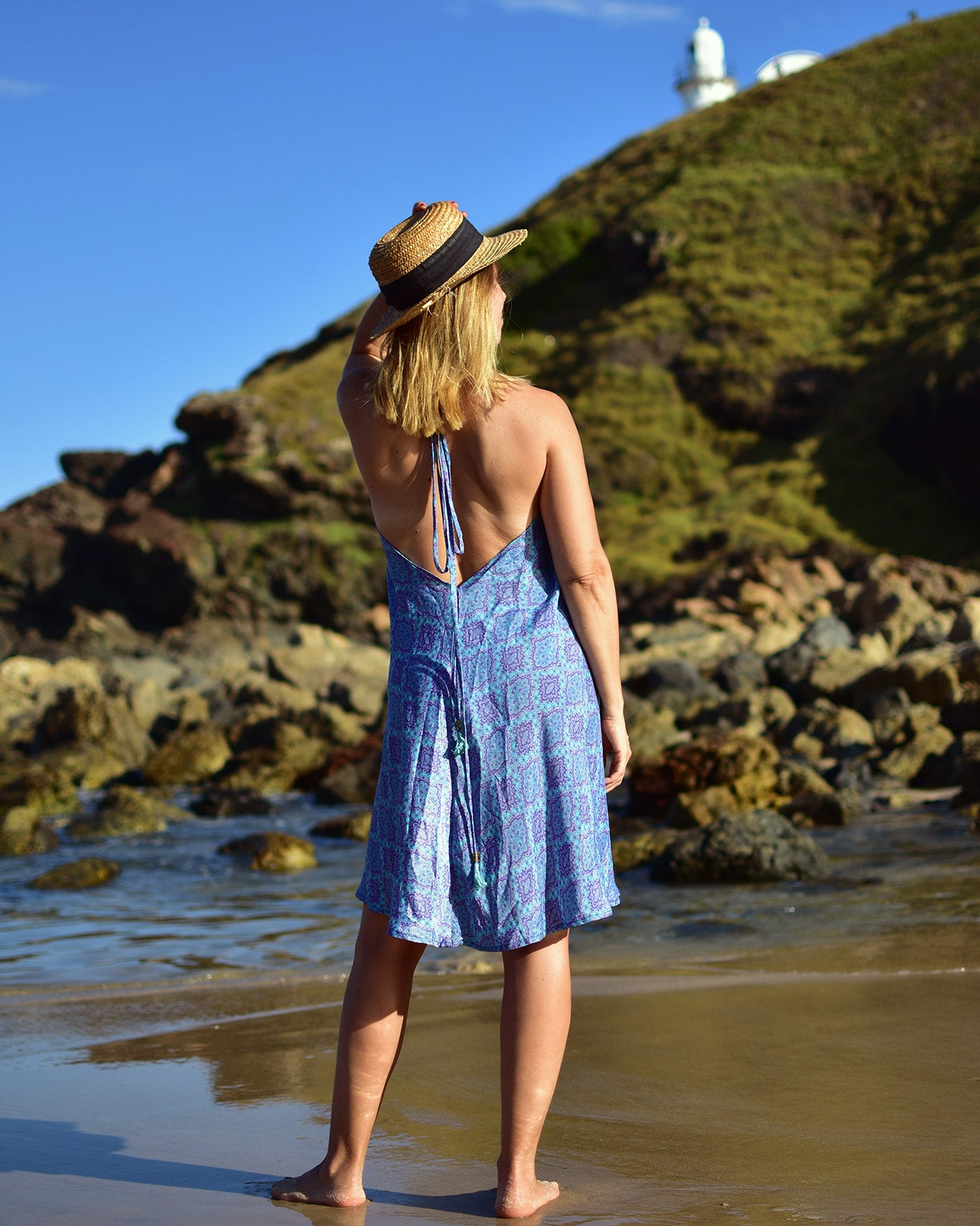Adicora Silk Mini Dress in vibrant blue geometric print with halter neckline and low back