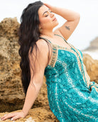 Banksia Maxi Dress featuring striking snake print in deep blues with deep V-neckline