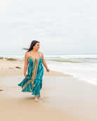 Banksia Maxi Dress featuring striking snake print in deep blues with deep V-neckline