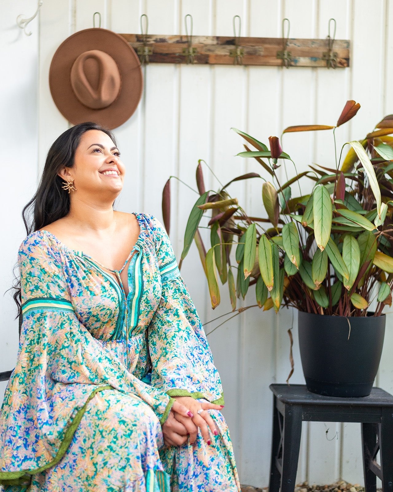 Dromana Maxi Dress featuring intricate floral print in blues and greens with deep V-neckline