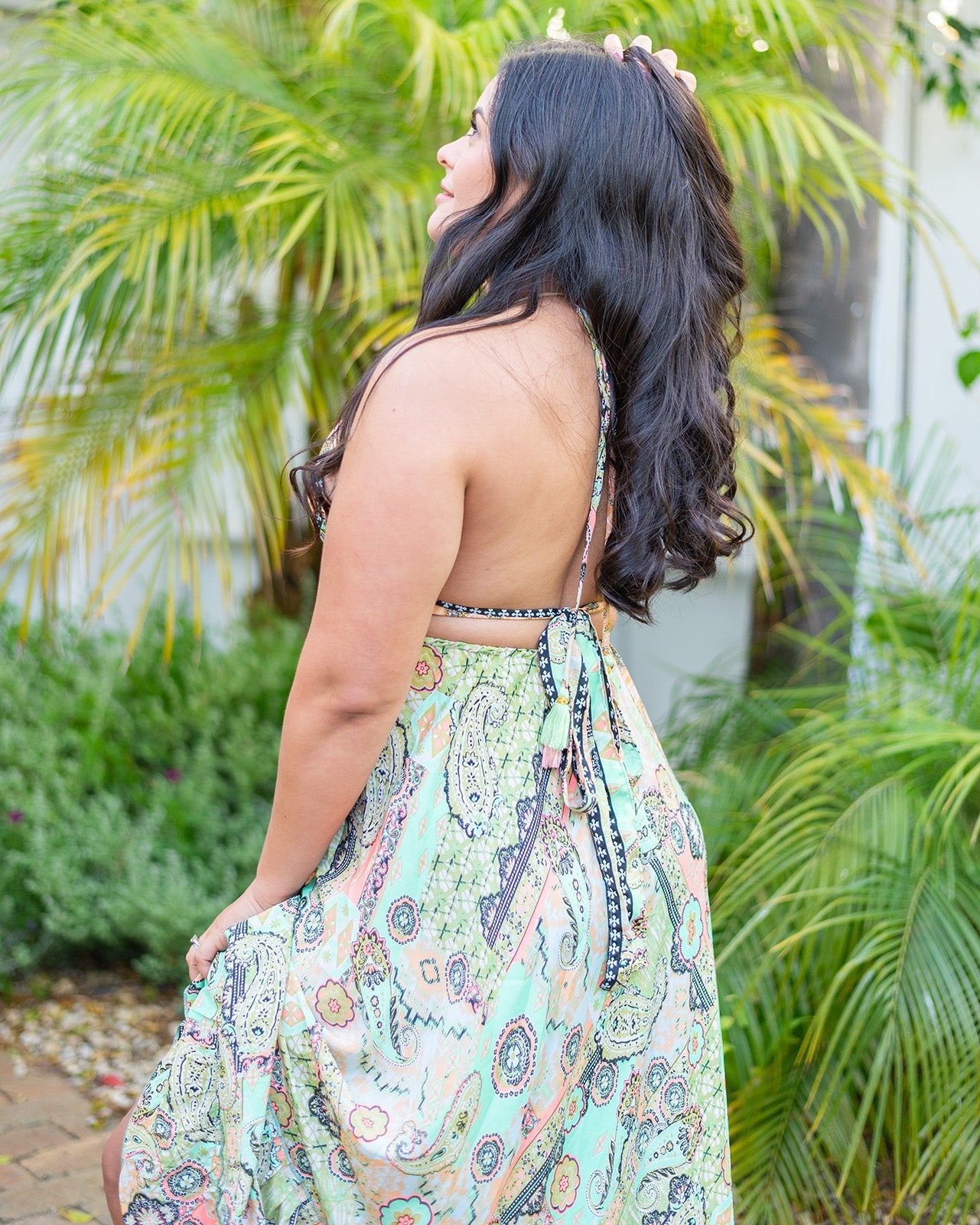 Quinn Maxi Dress showcasing vibrant paisley patterns in mint, peach, and soft yellow