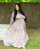 Shyla Maxi Dress featuring a pastel paisley print with embroidered bottom detail