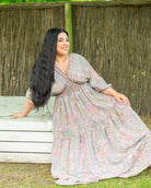 Shyla Maxi Dress featuring a pastel paisley print with embroidered bottom detail