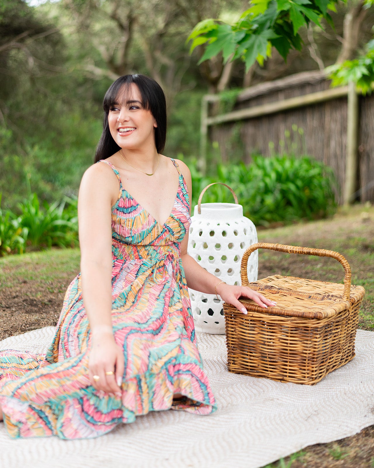 Tiwi Midi Dress featuring a vibrant pastel wave print with adjustable straps for customised fit